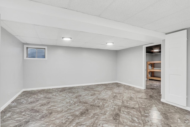 basement with a drop ceiling