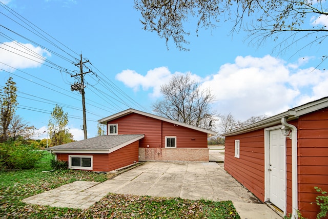 view of property exterior featuring a patio