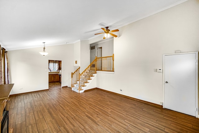 unfurnished living room with ceiling fan, wood-type flooring, and ornamental molding