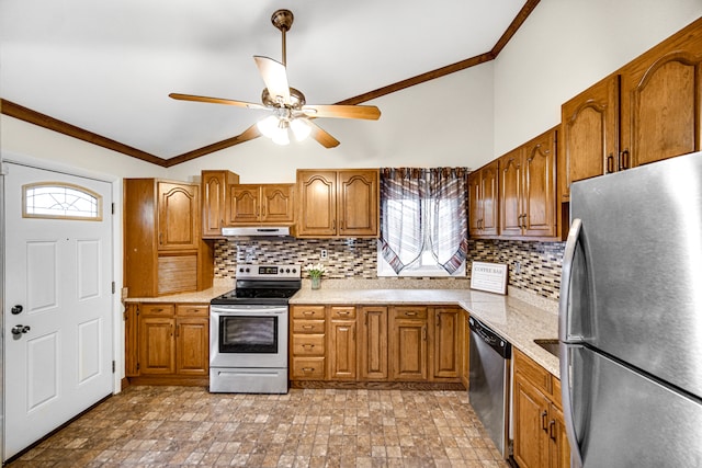 kitchen featuring crown molding, stainless steel appliances, lofted ceiling, and tasteful backsplash