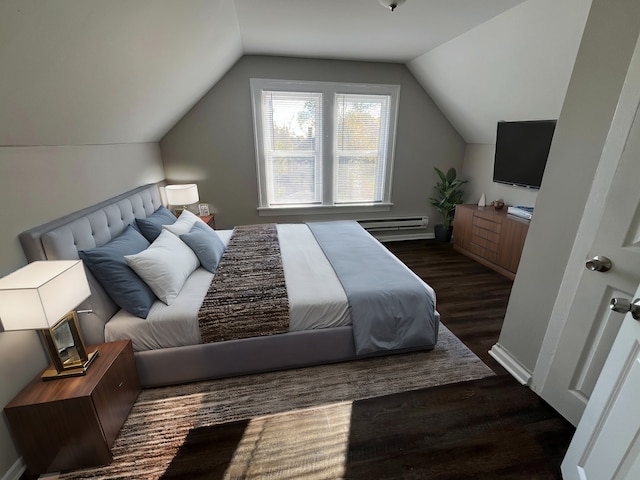 bedroom featuring lofted ceiling, baseboard heating, and dark hardwood / wood-style flooring