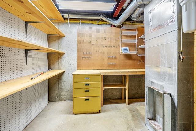 basement with a workshop area