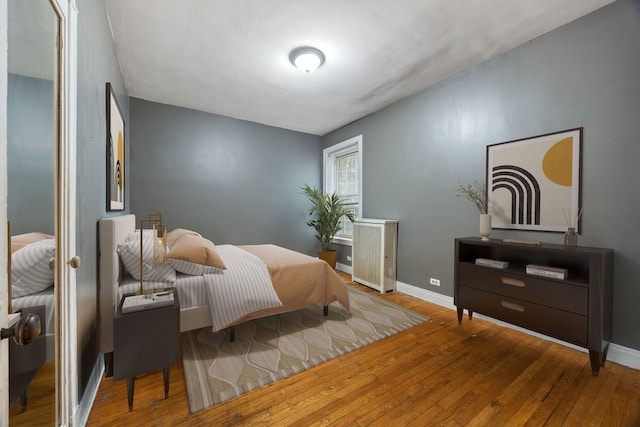 bedroom featuring hardwood / wood-style floors