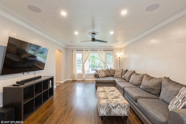 living room featuring ornamental molding, dark hardwood / wood-style floors, and ceiling fan