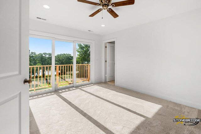 walk in closet featuring carpet flooring