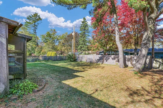 view of yard featuring a sunroom