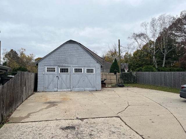 view of outbuilding featuring a garage