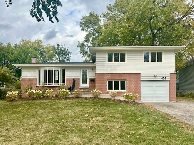 split level home featuring a front lawn and a garage