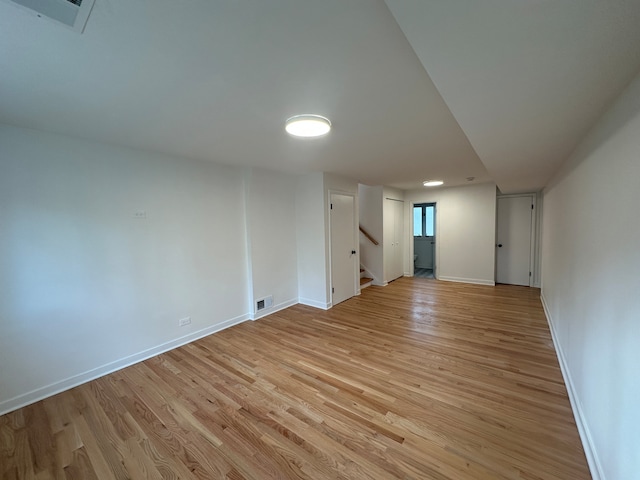 unfurnished room featuring light wood-type flooring