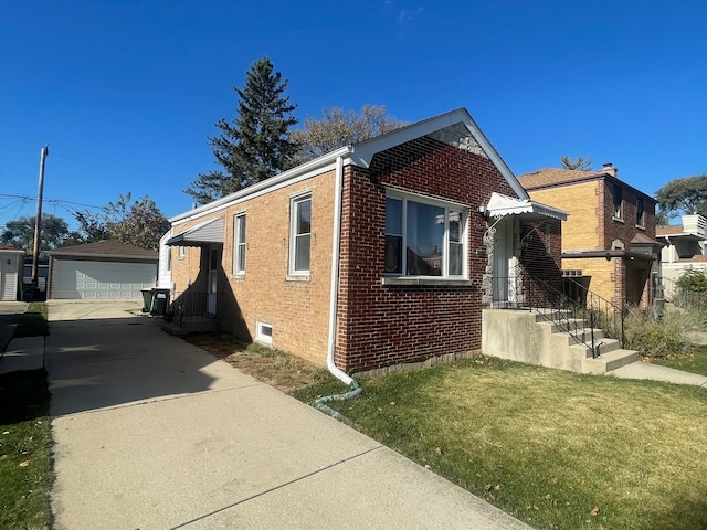 view of home's exterior featuring a garage, a yard, and an outdoor structure