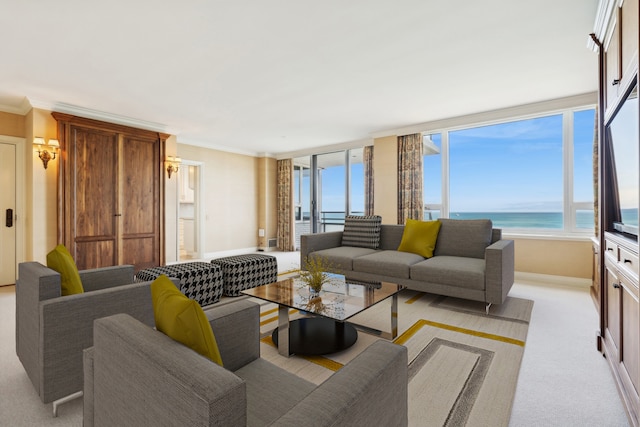 living room with crown molding, a water view, and light colored carpet