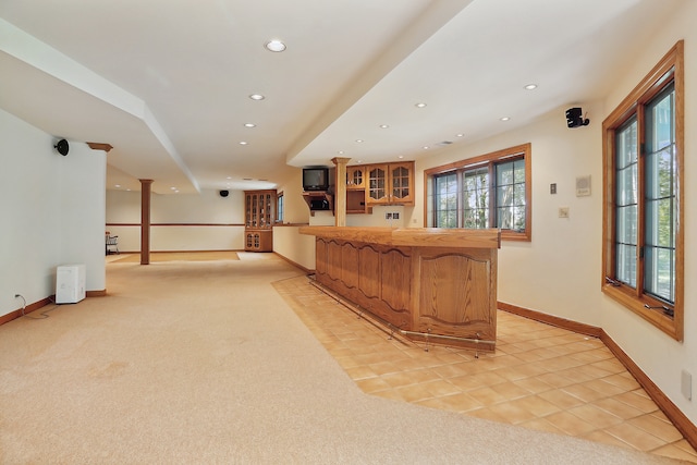 bar featuring light colored carpet