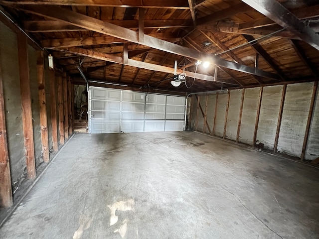 garage featuring a garage door opener