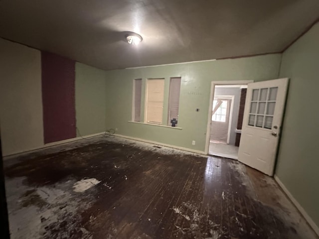 unfurnished room featuring wood-type flooring