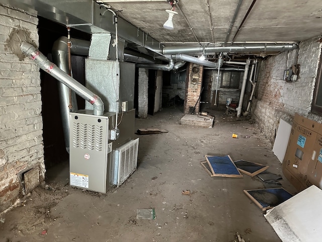 basement featuring heating unit