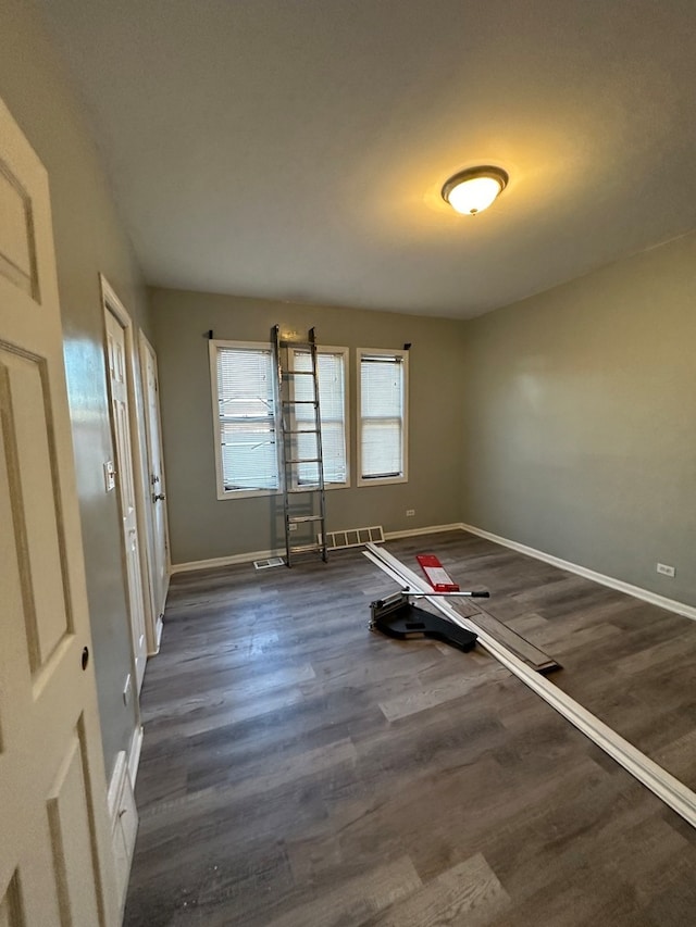 interior space featuring dark wood-type flooring