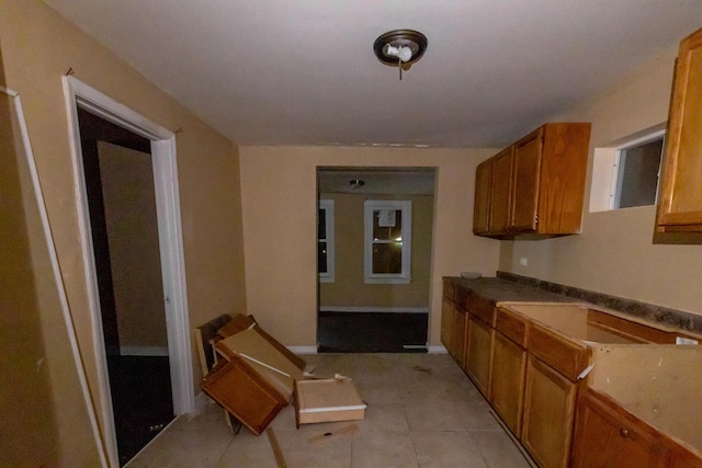 kitchen with light tile patterned floors