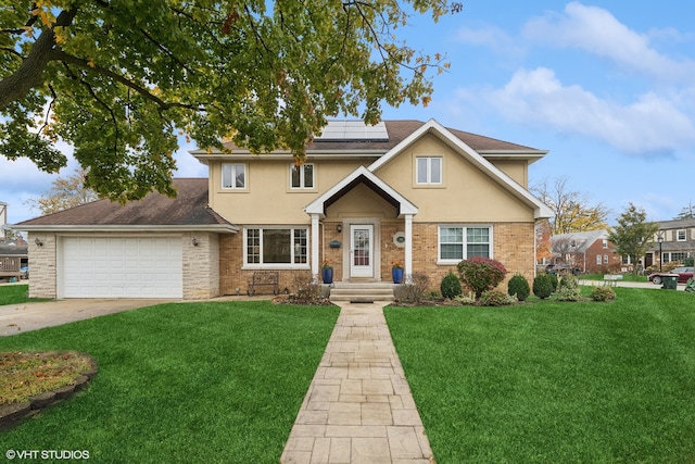 view of front of house with solar panels, a garage, and a front lawn