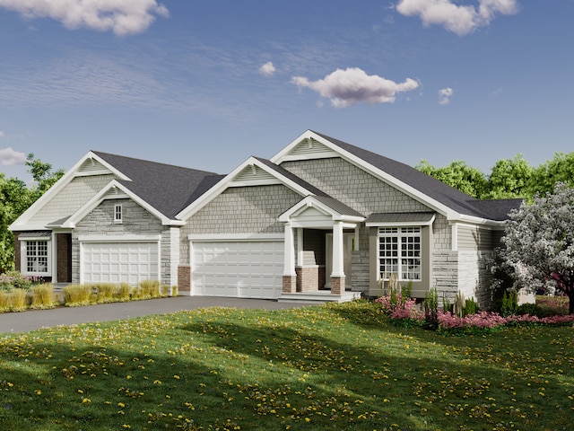 craftsman-style home with a front lawn and a garage