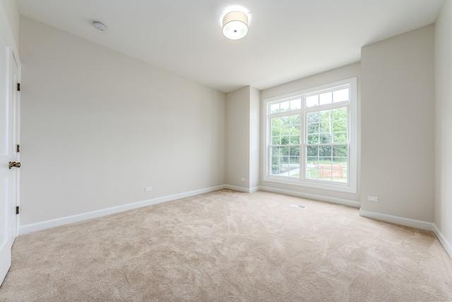 view of carpeted spare room