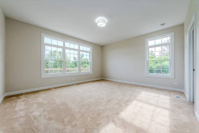 view of carpeted spare room