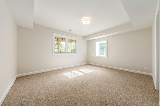 empty room featuring carpet flooring