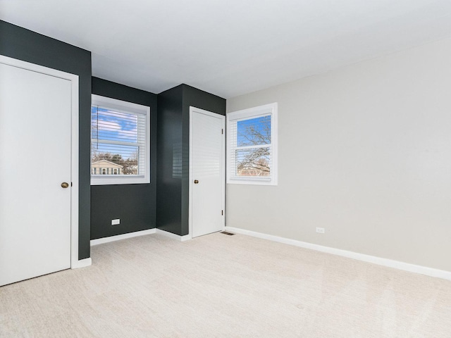 unfurnished bedroom featuring a closet