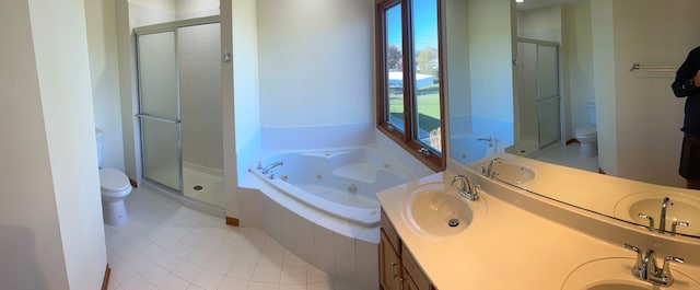 full bathroom featuring toilet, independent shower and bath, and plenty of natural light