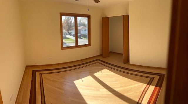 unfurnished room with ceiling fan