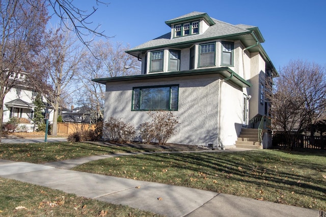 view of property exterior with a yard