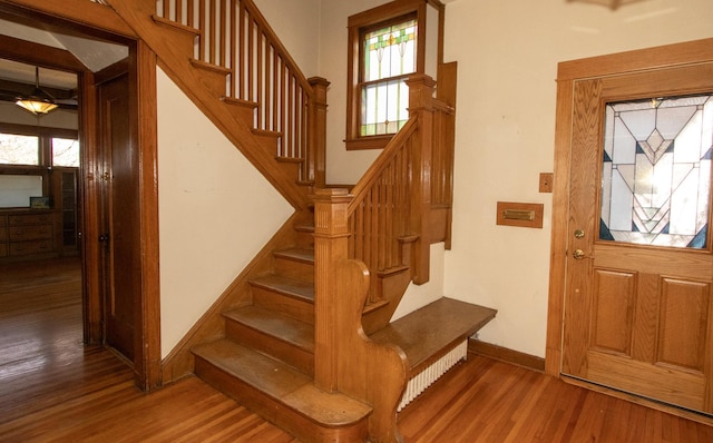 foyer entrance featuring hardwood / wood-style floors