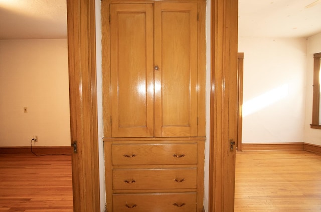 interior details with hardwood / wood-style flooring