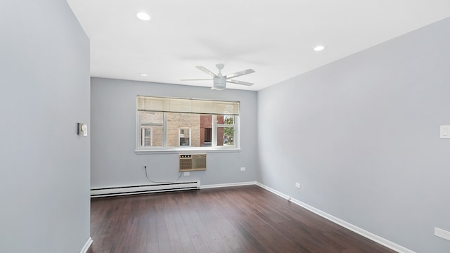 unfurnished room featuring a wall mounted AC, ceiling fan, dark wood-type flooring, and a baseboard radiator