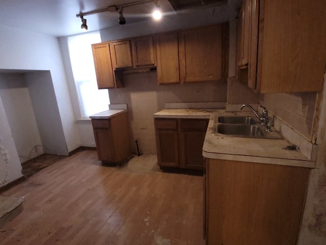 unfurnished dining area featuring hardwood / wood-style flooring and an inviting chandelier