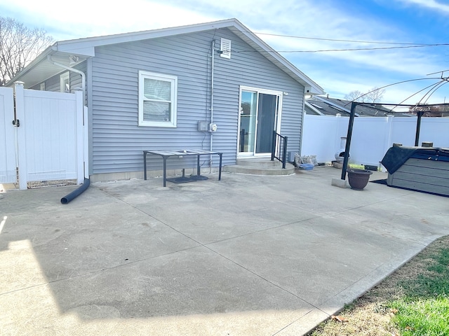 rear view of house with a patio