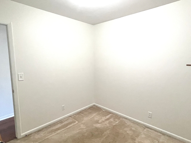 spare room featuring carpet floors