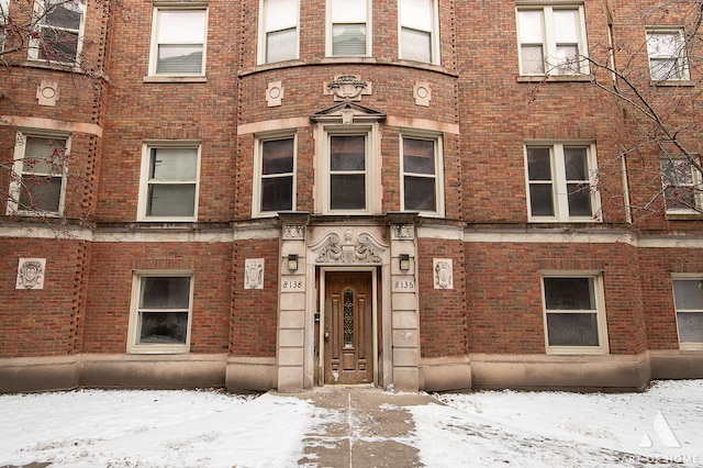 view of snow covered building