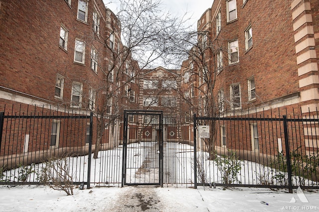 view of snow covered gate