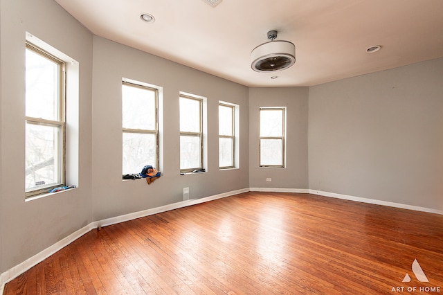 spare room featuring hardwood / wood-style flooring