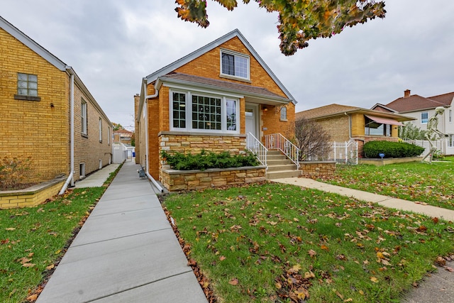 view of front facade with a front yard