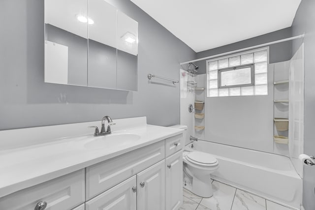 full bathroom featuring toilet, vanity, and shower / washtub combination