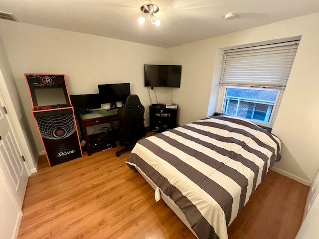 bedroom featuring light wood-type flooring