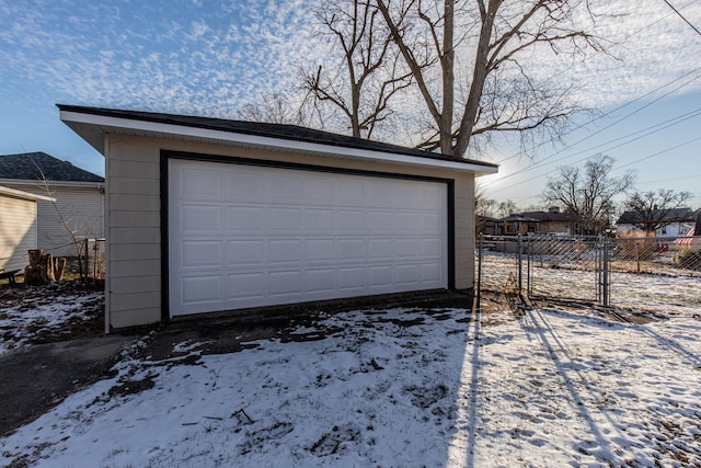 view of snow covered garage