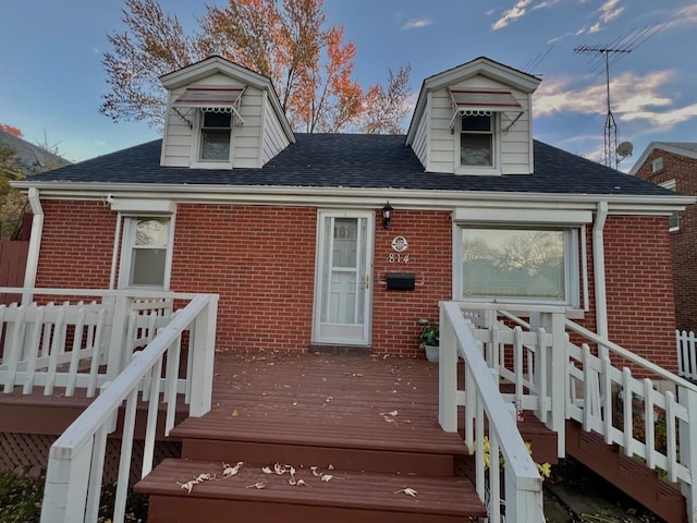 view of front of house featuring a deck