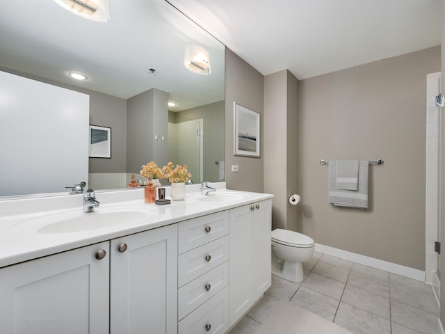 bathroom with toilet, an enclosed shower, vanity, and tile patterned floors