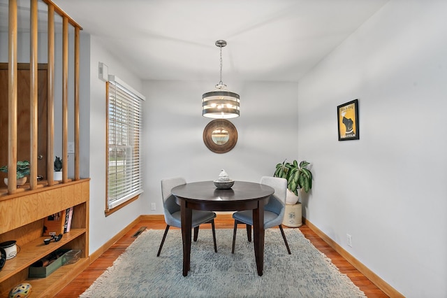 dining area featuring hardwood / wood-style floors