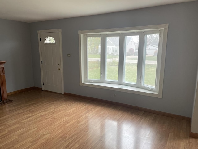 entrance foyer with light hardwood / wood-style floors