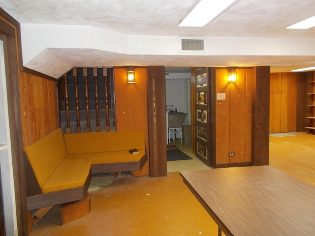 basement with wood walls