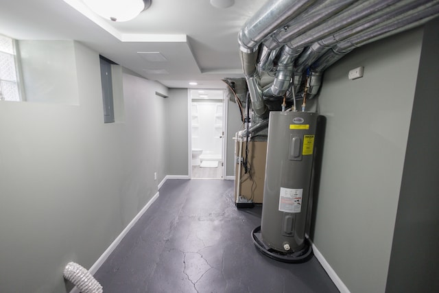 utility room featuring electric water heater