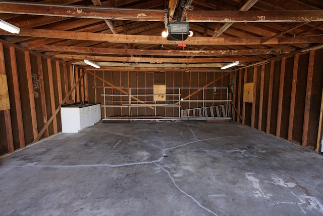 garage featuring a garage door opener